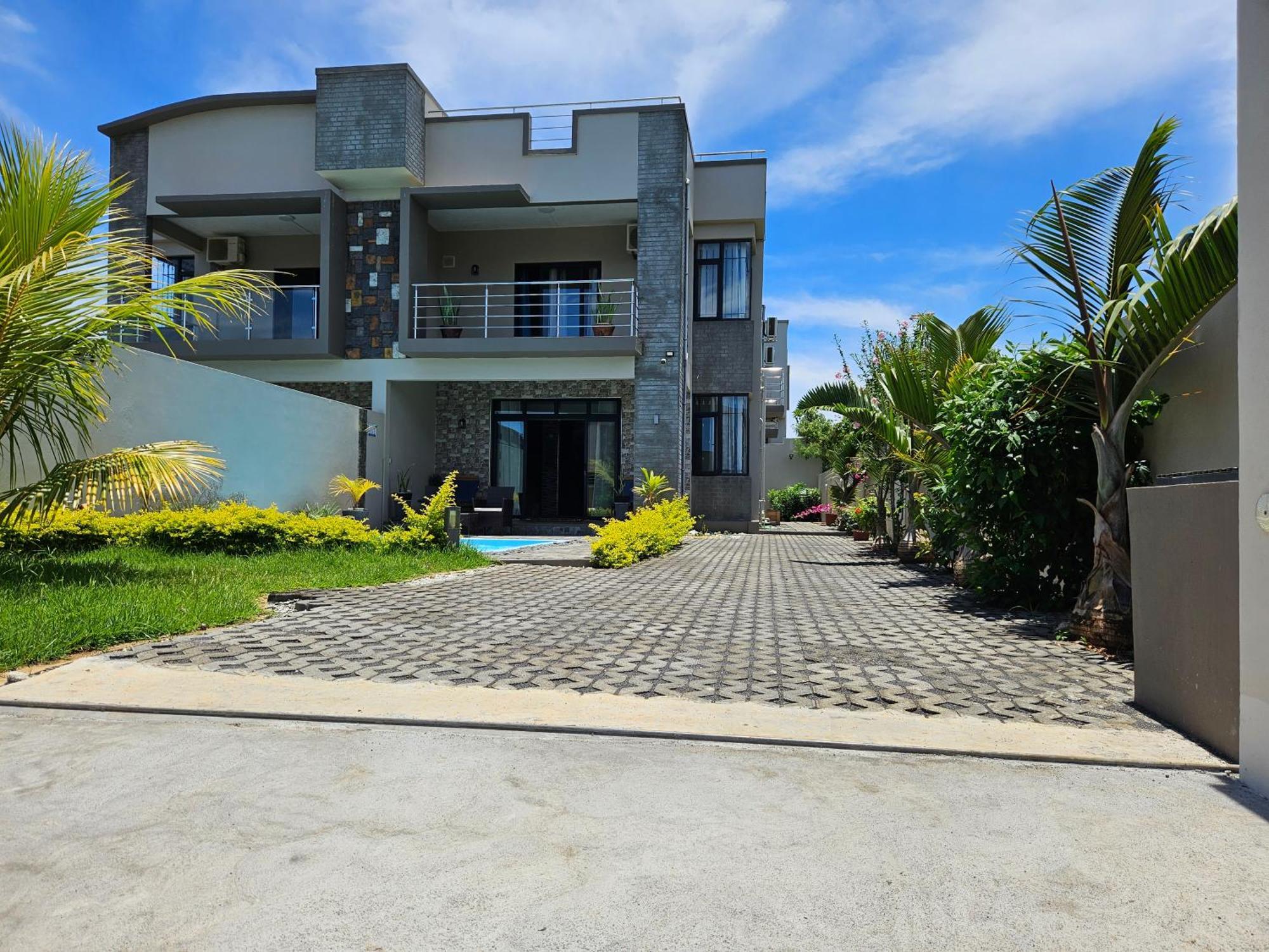Villa Aahana - Flic En Flac Bagian luar foto